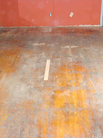 old-torn-scratched-dirty-flooring-in-need-of-replacement